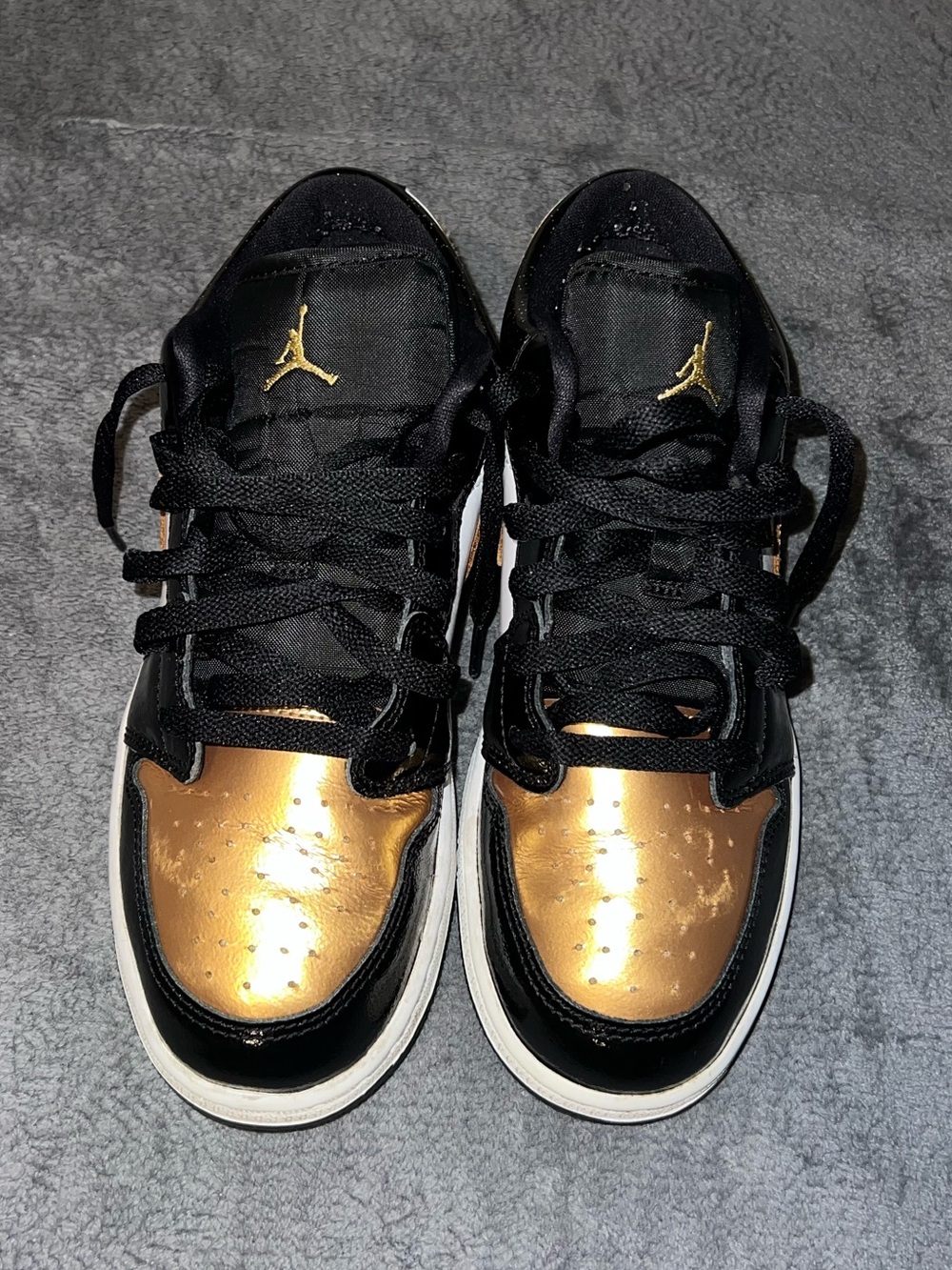 Air Jordan 1 Low ‘Gold Toe’ SE GS Black and Gold Metallic Sneakers